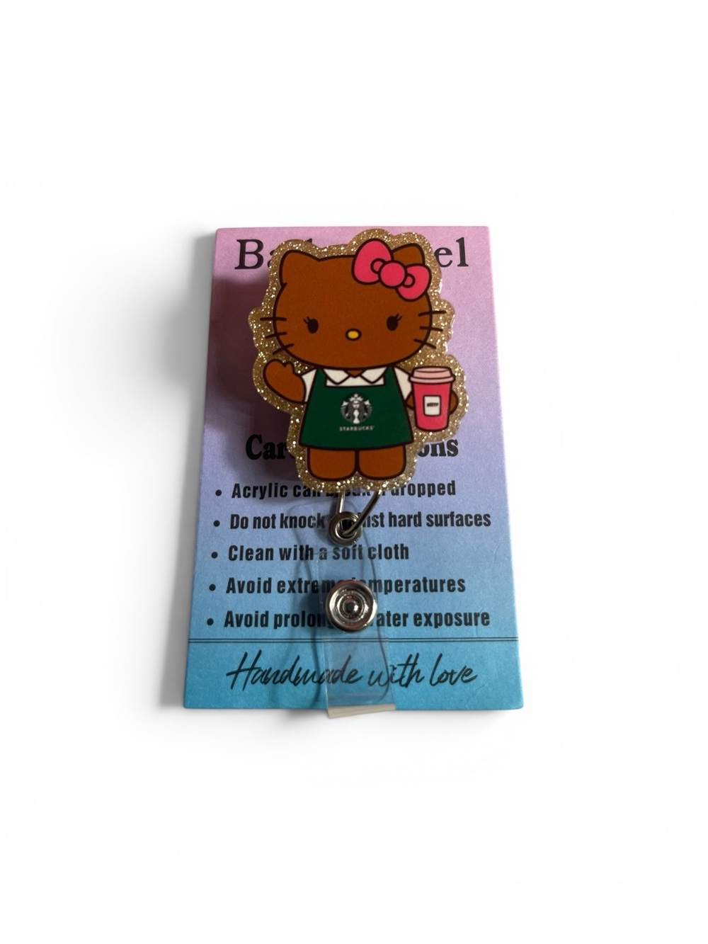 Hello Kitty Brown Pink Green Gold Badge Reel